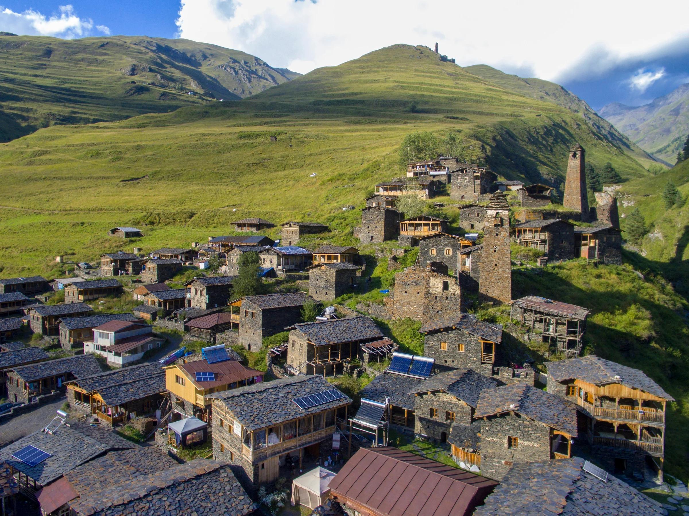 An aerial view of a village in the mountains