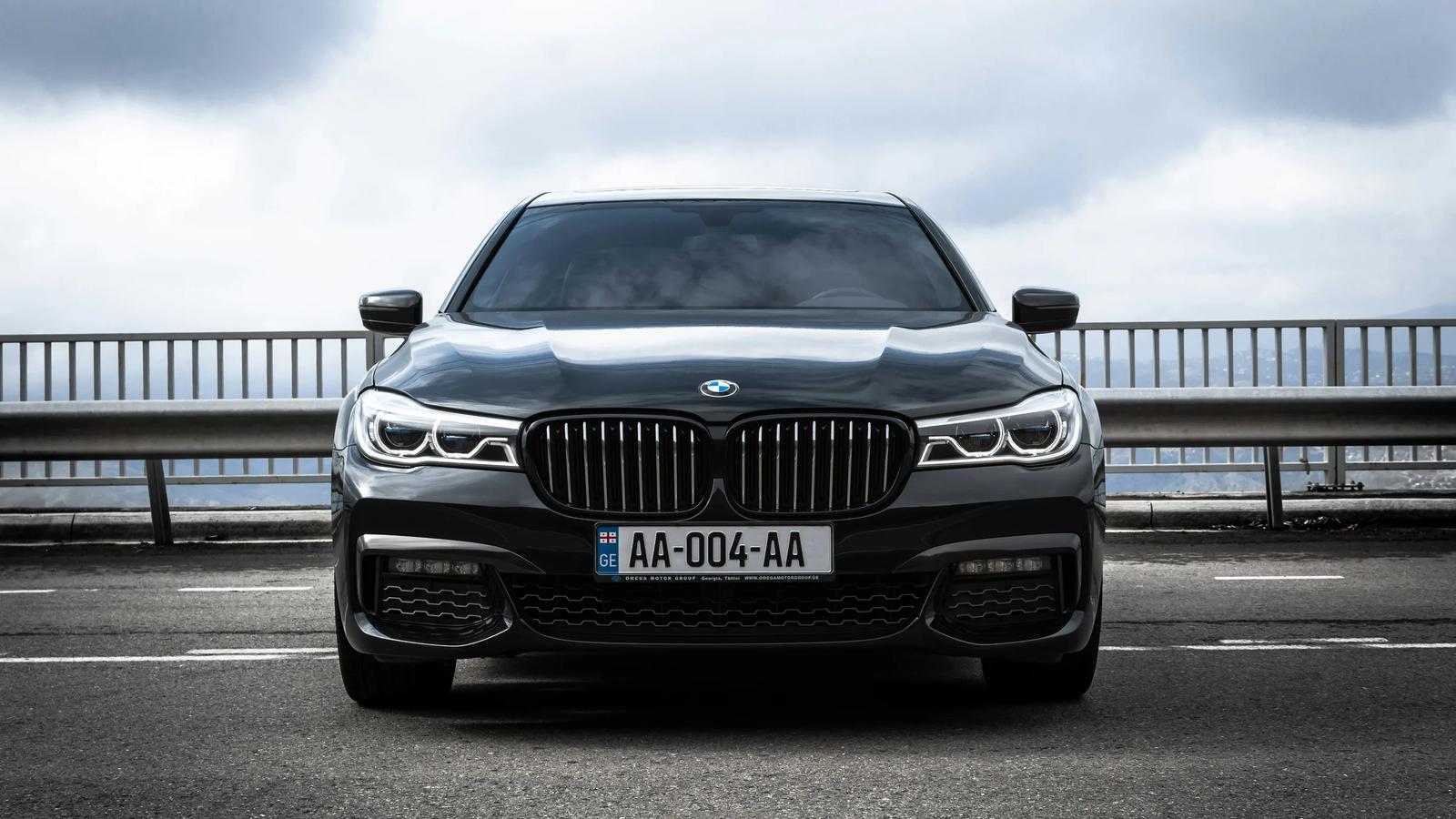black bmw m 3 on gray pavement