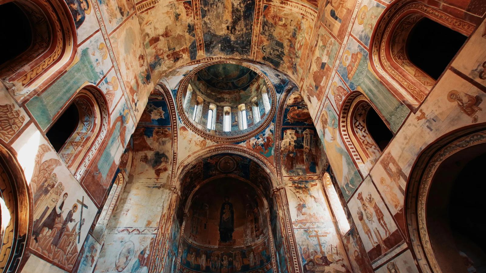 low angle photography of brown concrete building