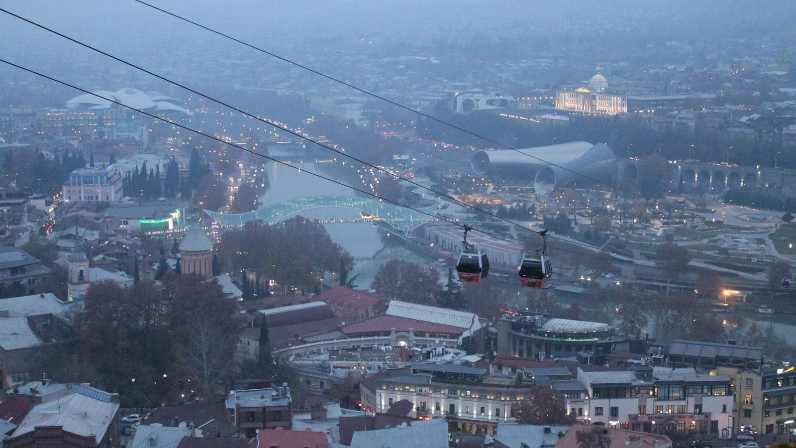 a view of a city from a cable car