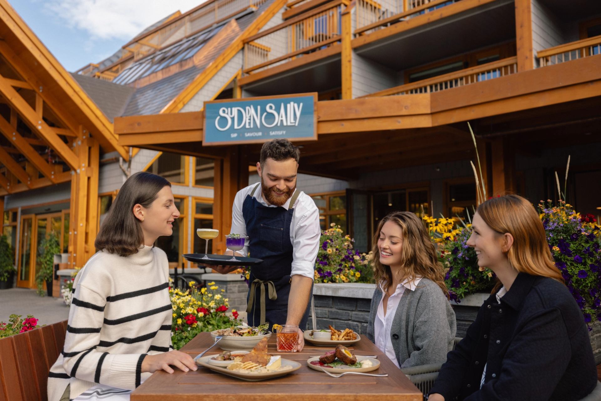 Group on patio dining at Sudden Sally