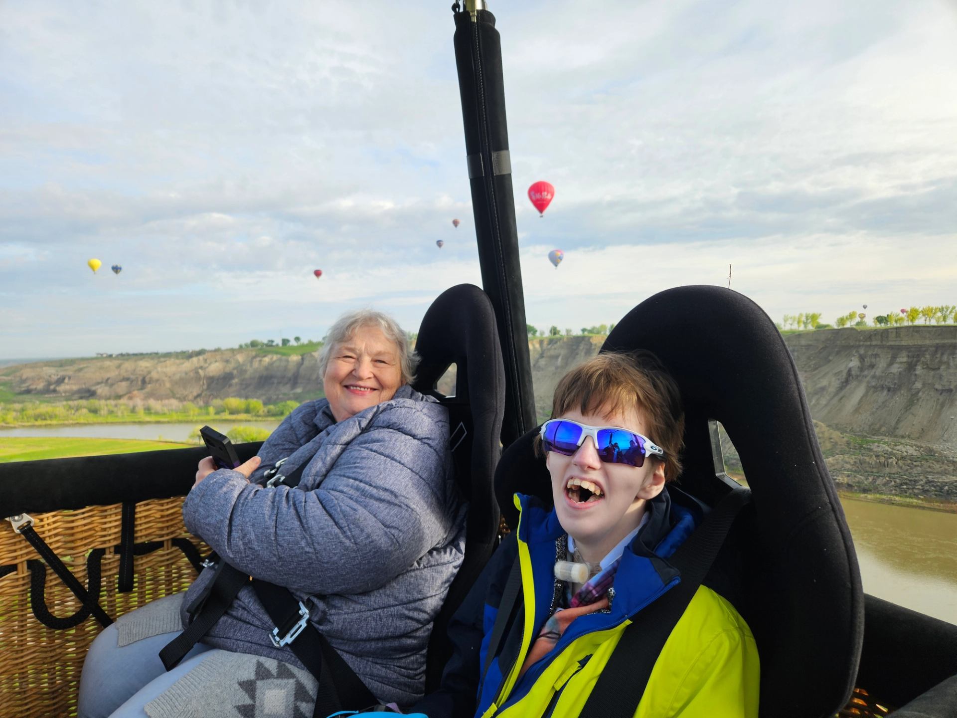 Two people in basket during scenic Air-ristocrat hot air balloon ride.