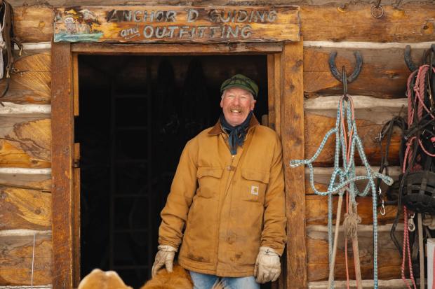 Operator standing in doorway at Anchor D Guiding & Outfitting Ltd.