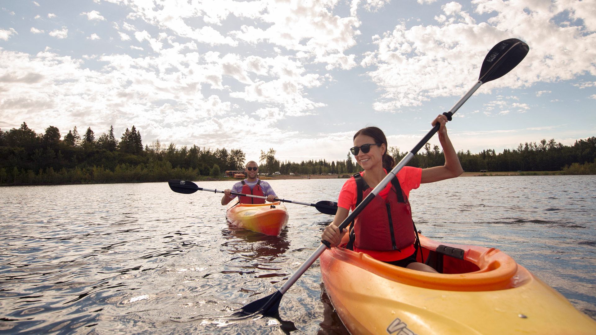 A couple of people in kayaks