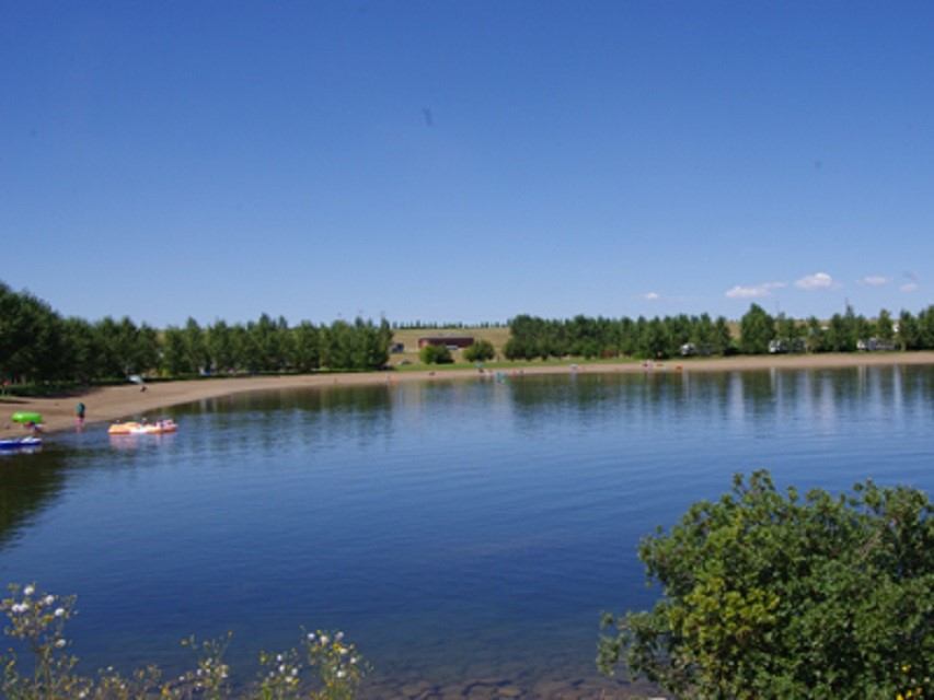 Beautiful beach with kayaks along the shore