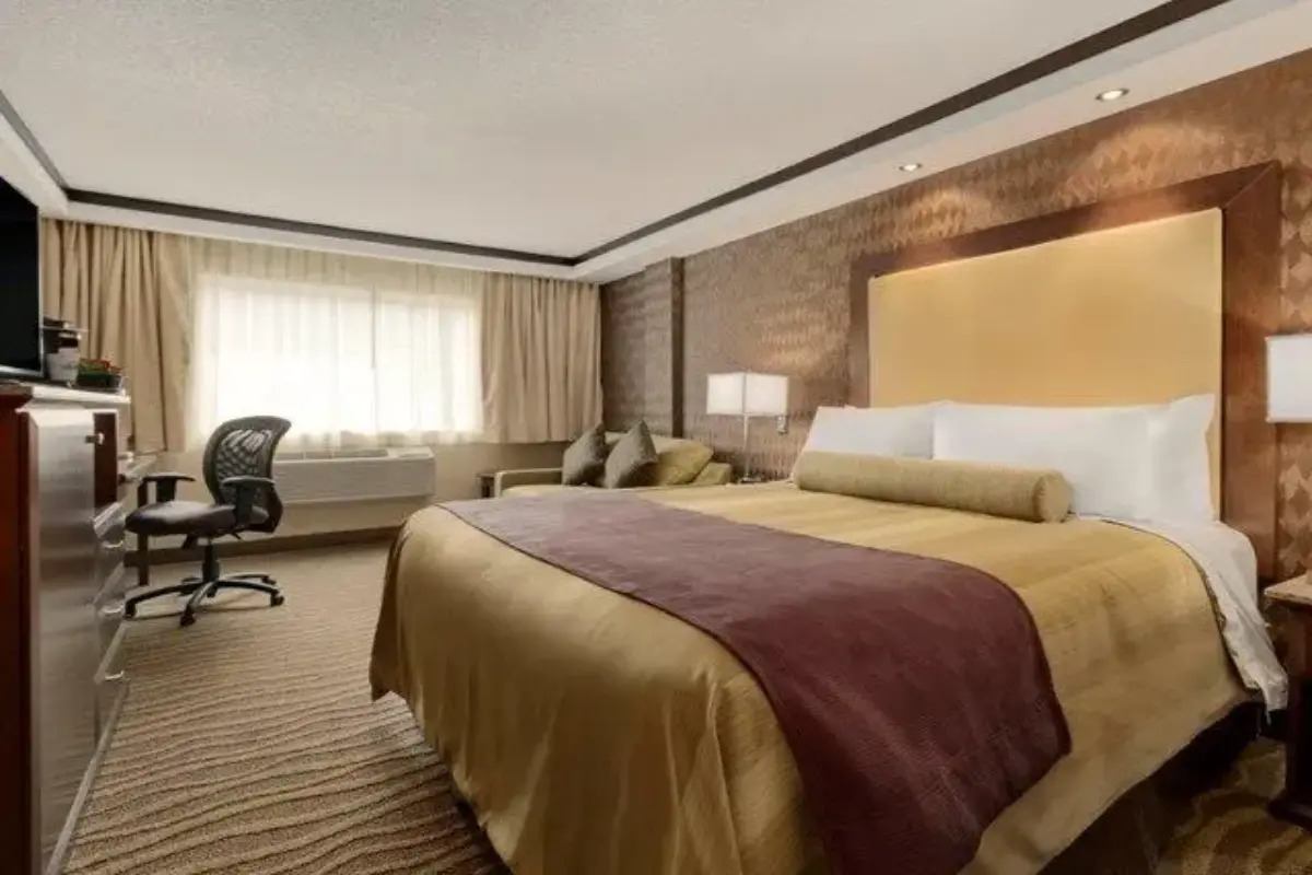 Guest room at Best Western Plus Edmonton Airport Hotel with a king bed.