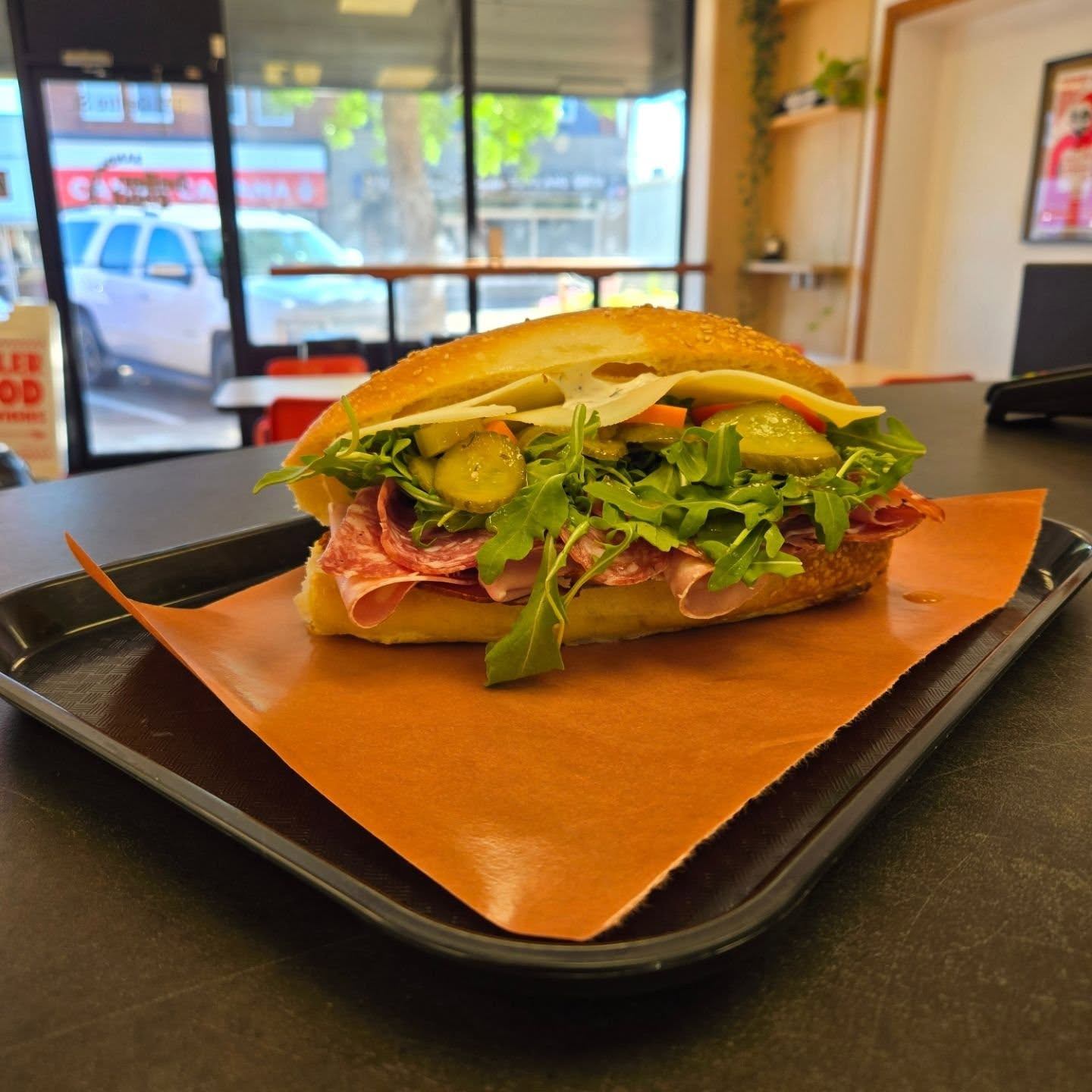 Italian Hoagie. On their house made hoagie roll. Mortadella, capicola, soppressata, house made giardiniera, Italian dressing, deli mayo, and arugula!