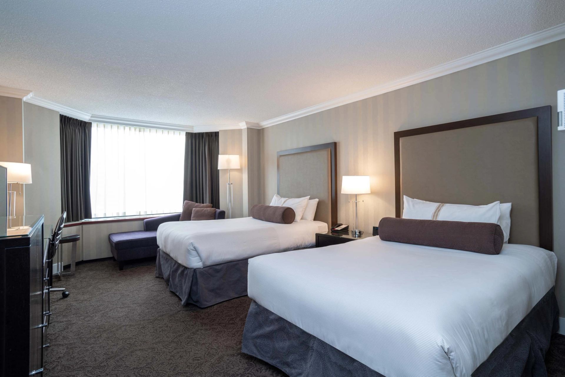 Room inside the hotel with two beds