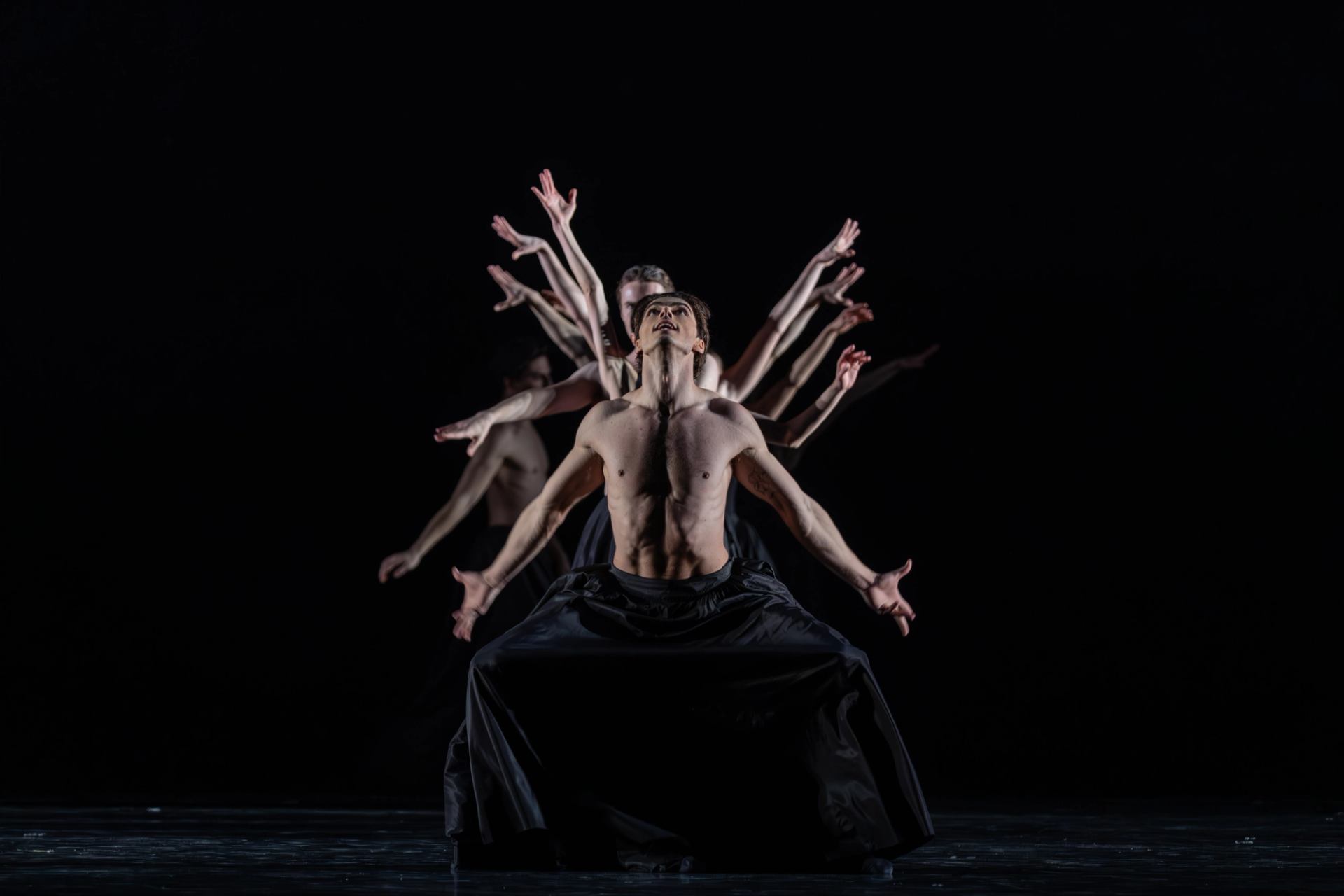 Artist performing a ballet act.