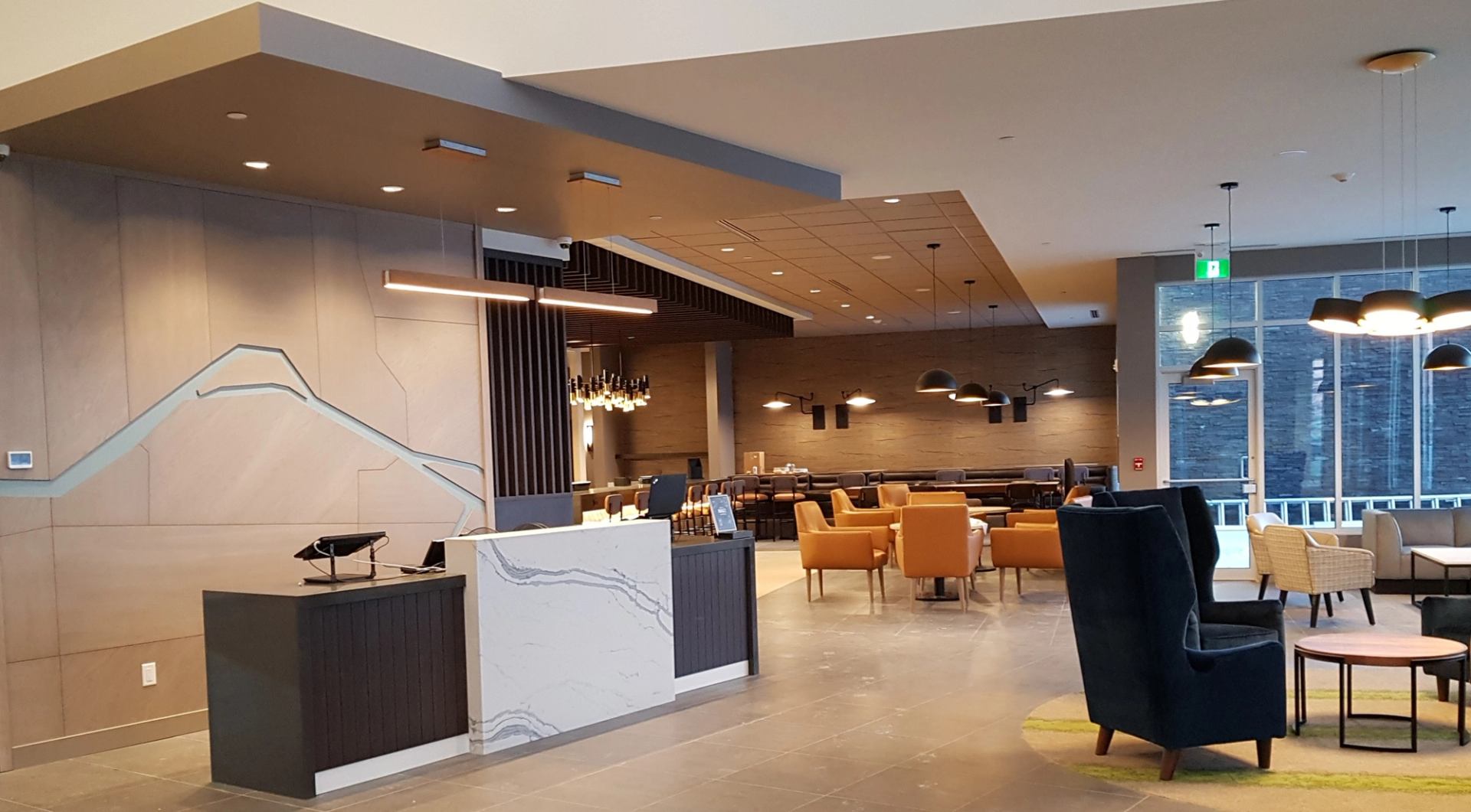 Modern Hyatt Place lobby with seating and reception desk.