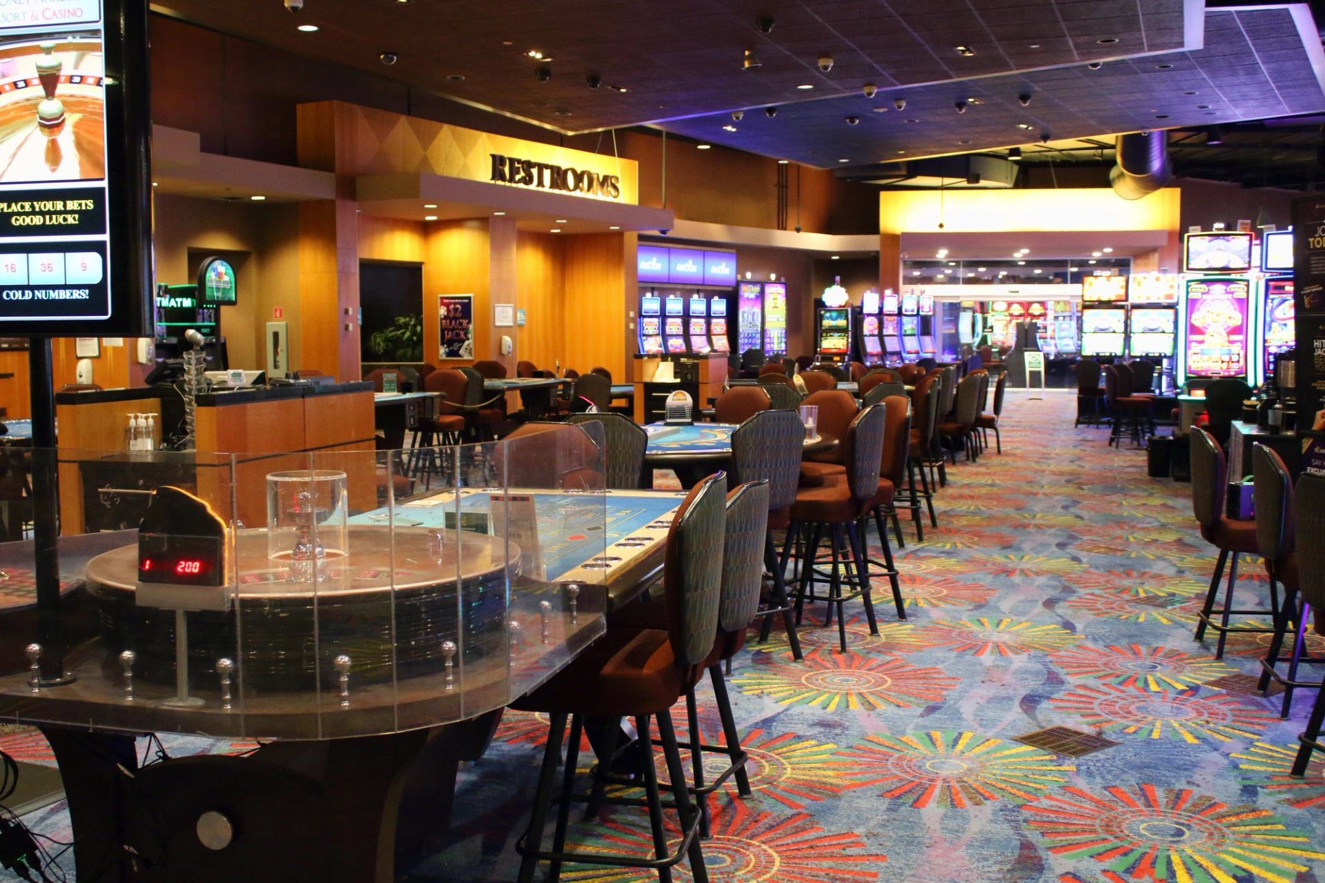 Bright gaming area with patterned carpet.