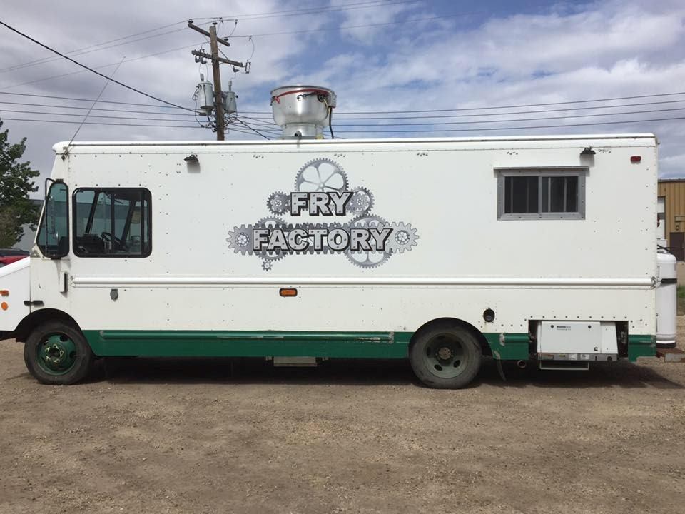 Fry Factory food truck with green and white design and gear graphics.