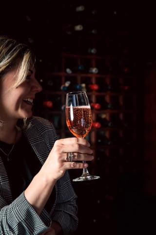 Woman drinking sparking wine at Eden Wine Cellar Experience