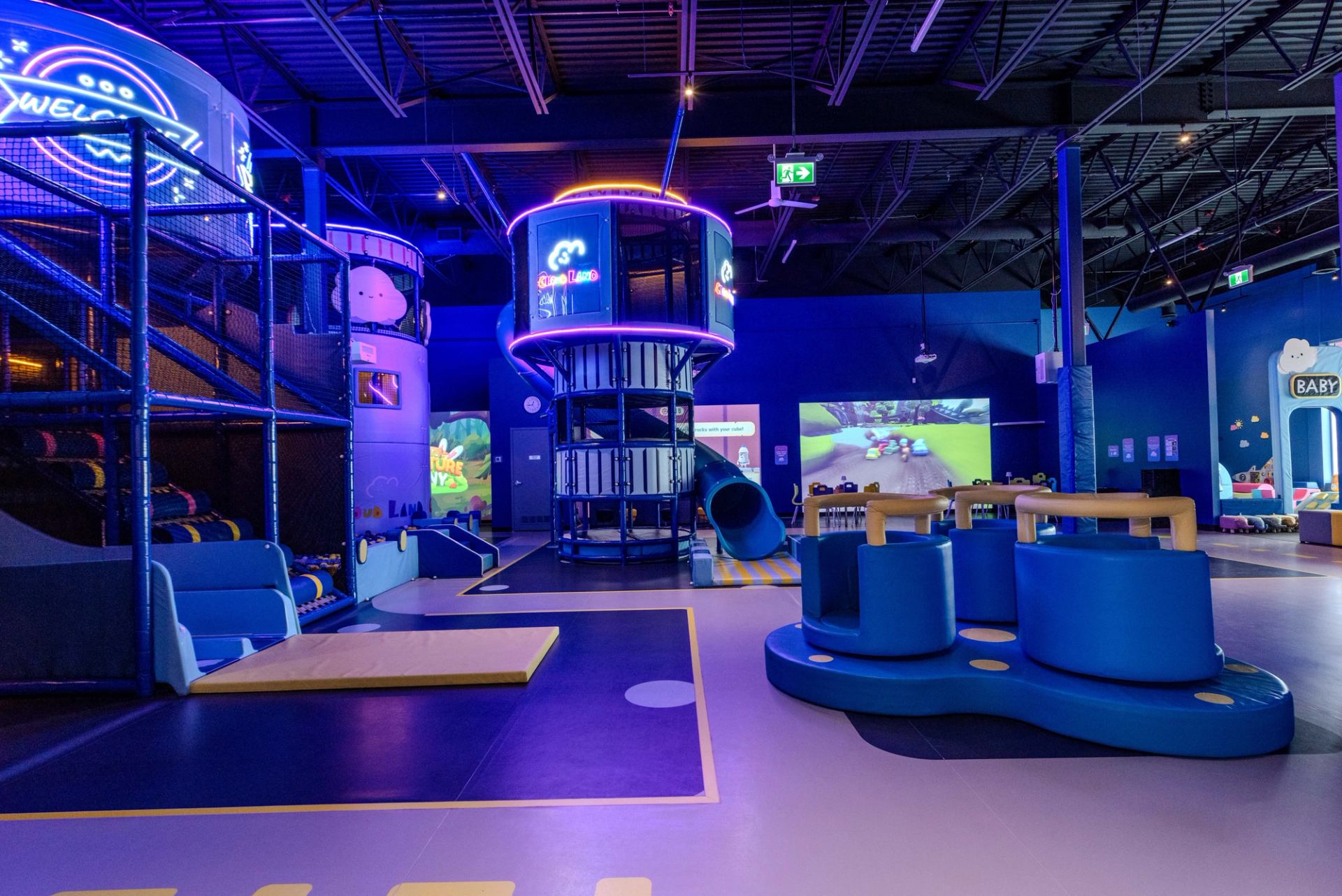 Large indoor play area with climbing structures, slides, and interactive zones at Cloud Land.