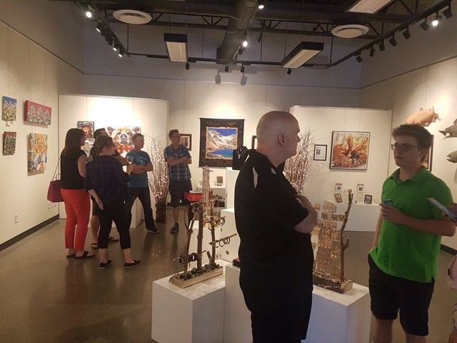 People viewing art at Canmore Art Guild Gallery.