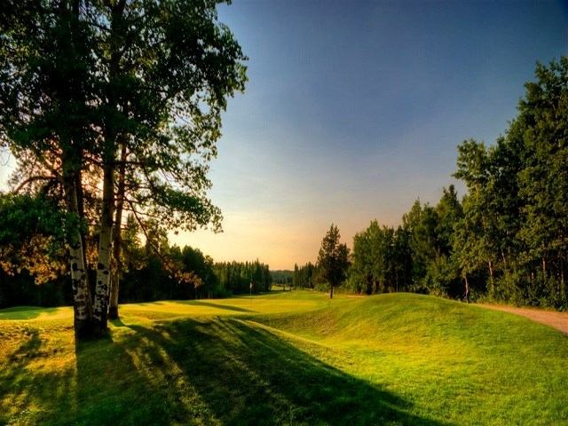 Beautiful sun setting at Pine Hills Golf Club