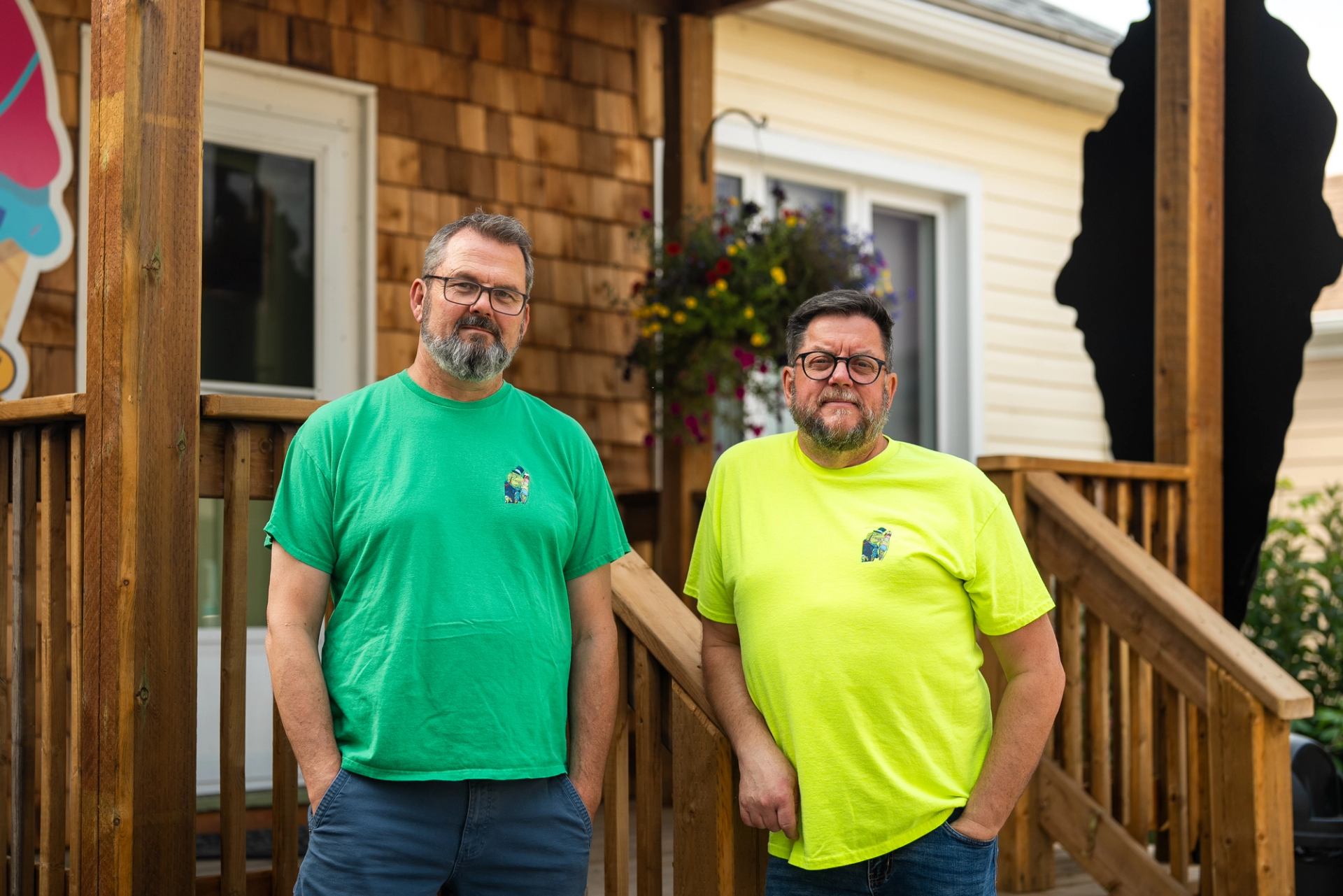 Owners of the Valley Ice Cream Shoppe in Drumheller pose for a portrait outside their shop.