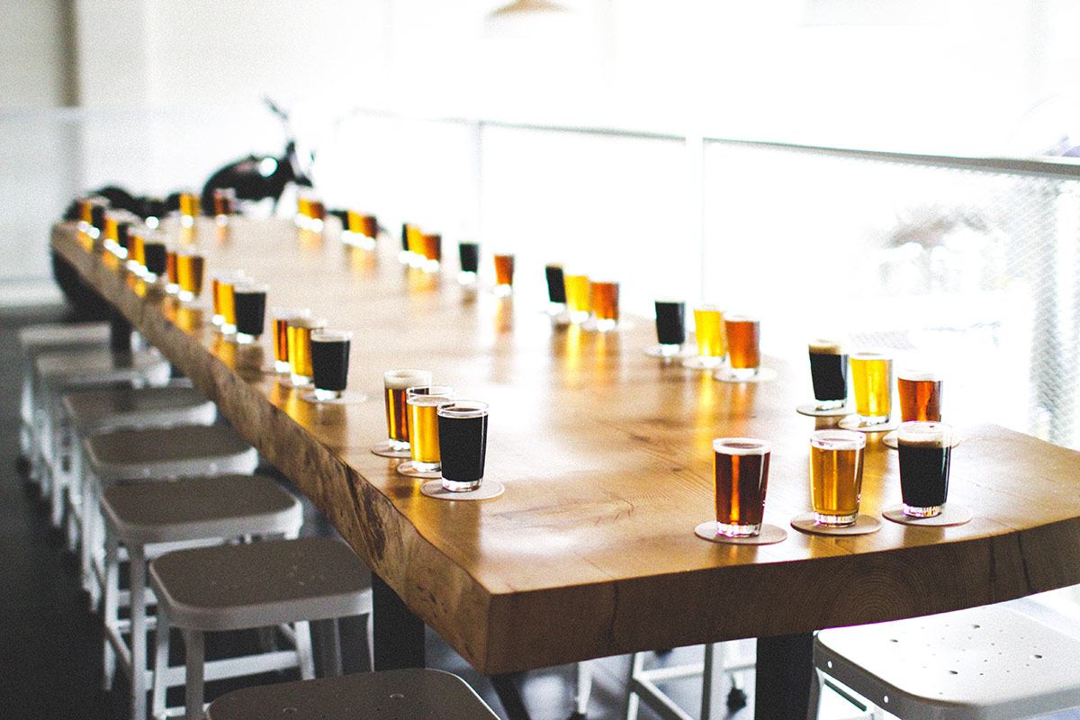 A long table lined up for 33 Acres brews