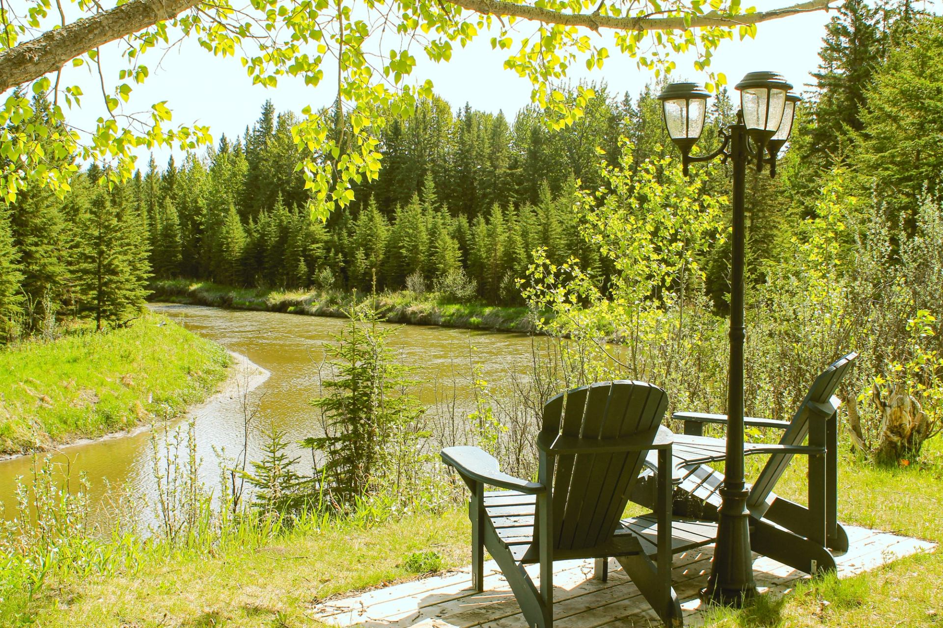 Two chairs overlooking the river