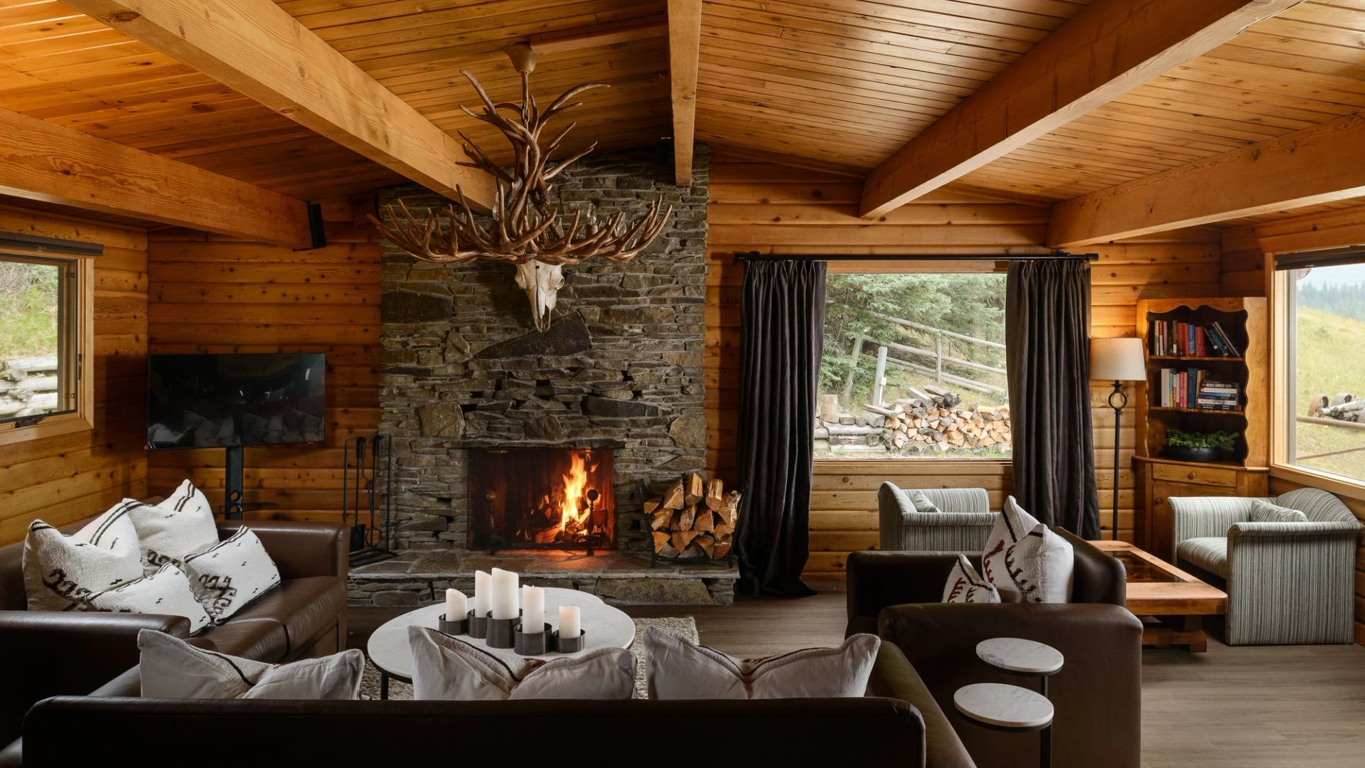 Interior view of the living space with a stone fireplace