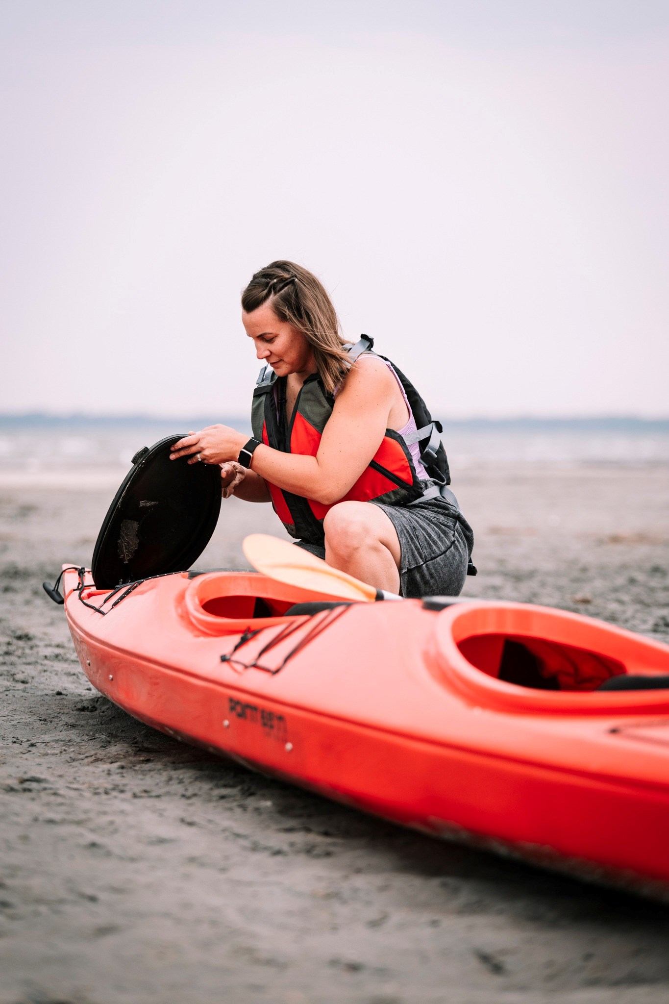 A woman with her kayak