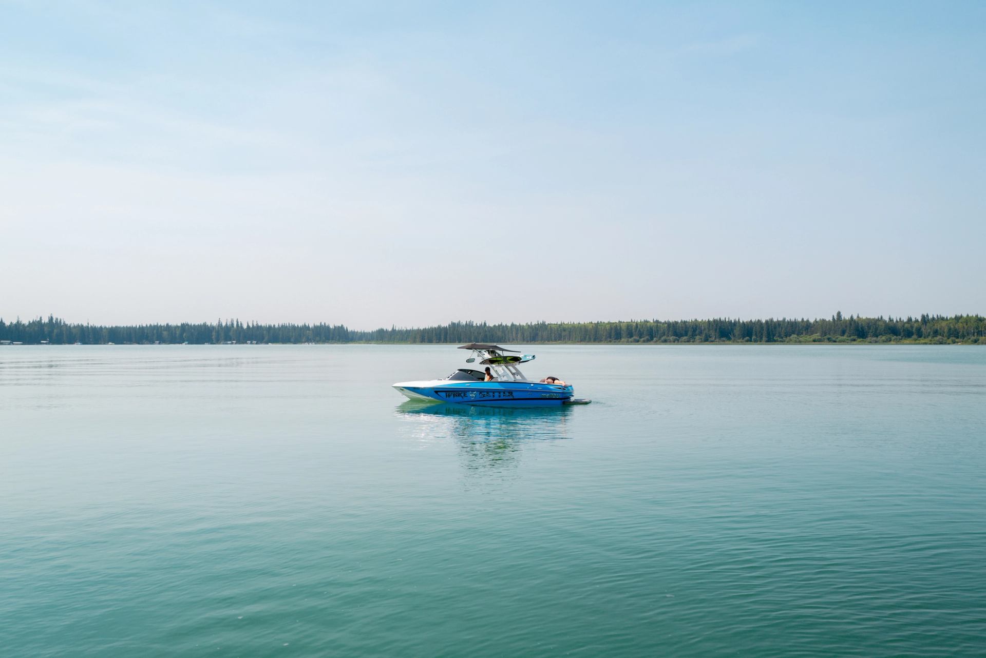 A boat in the water at Crane Lake West M.D. Park.