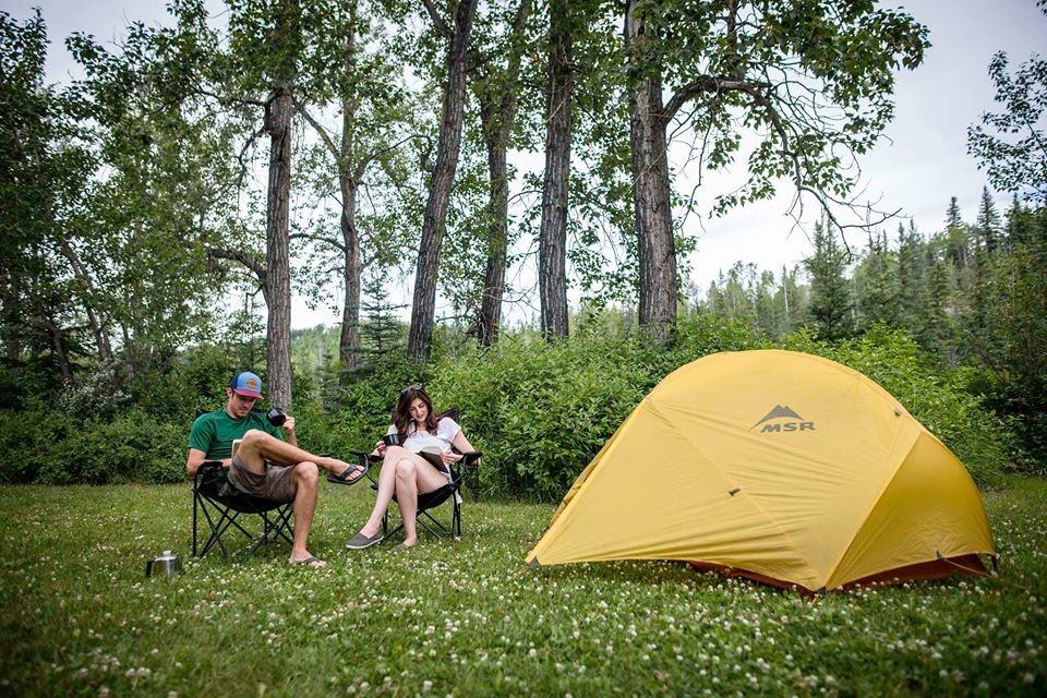 A couple tent camping