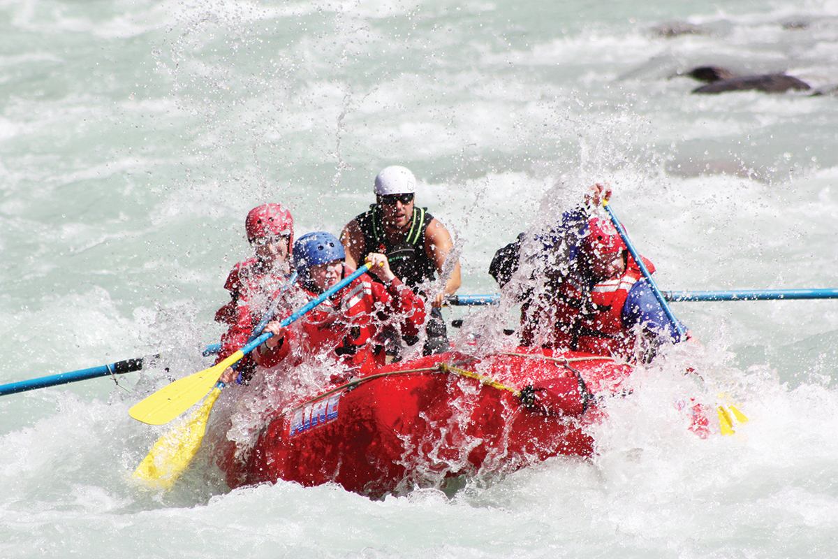 A group river rafting