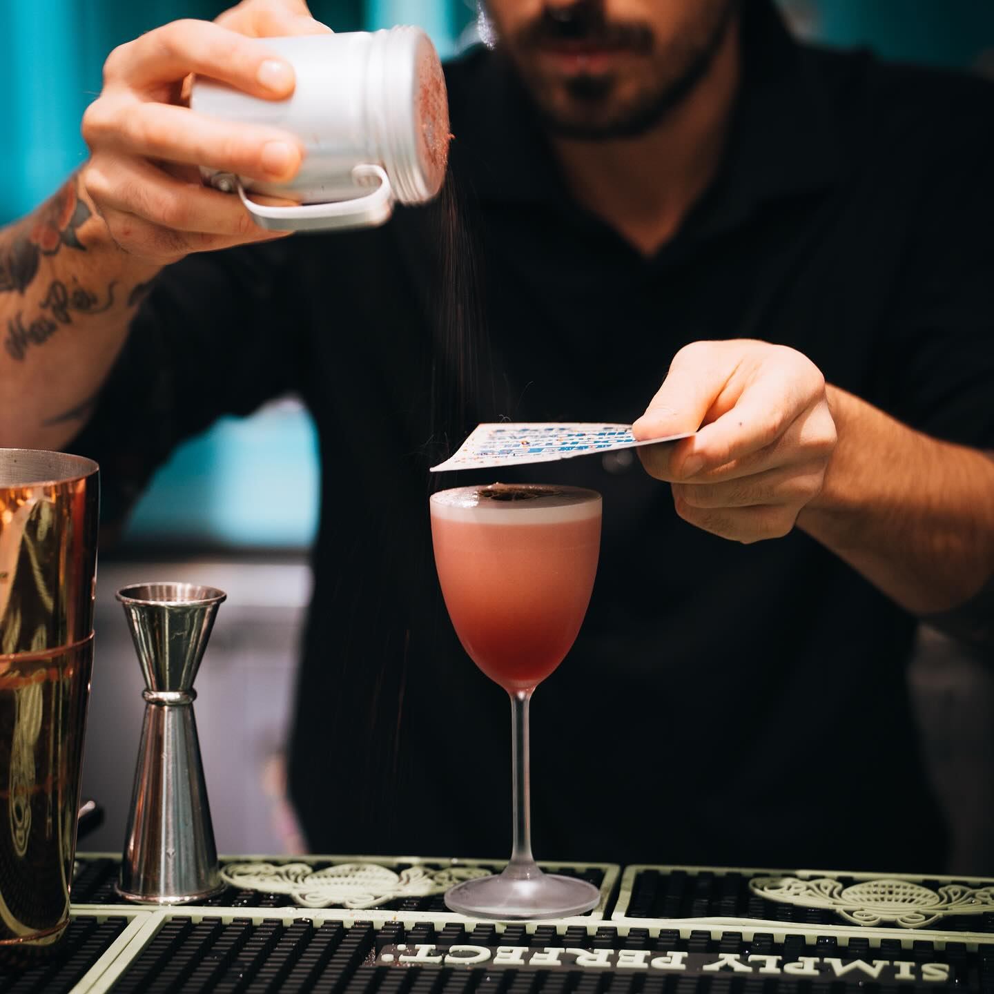 The mixologist making a tequila creation.