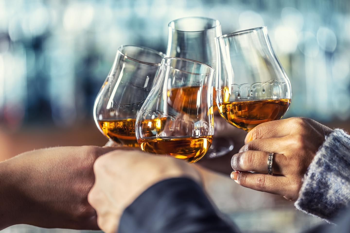 A group toasting with their spirits.