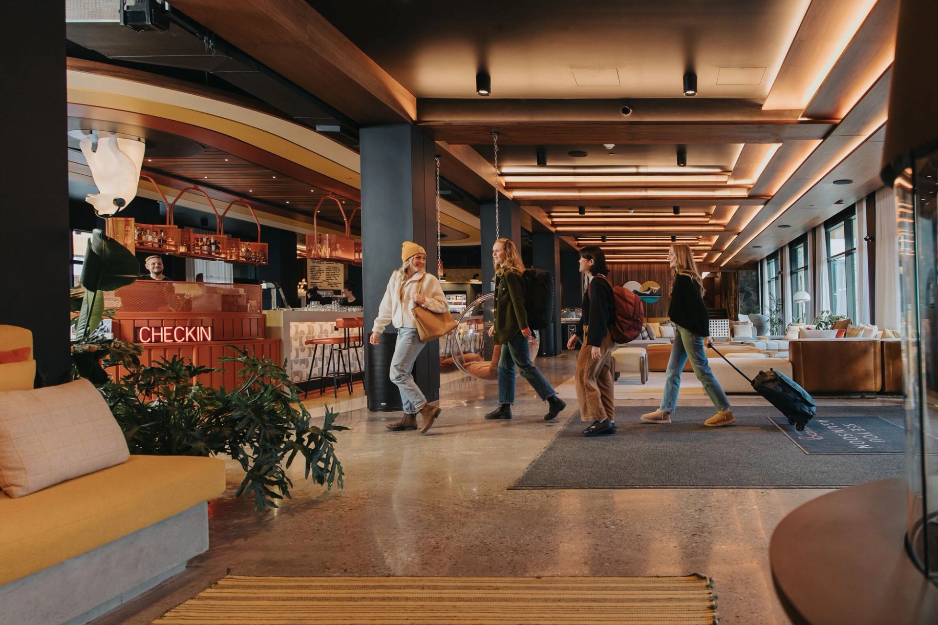 Friends check in at Moxy Hotel in Banff.