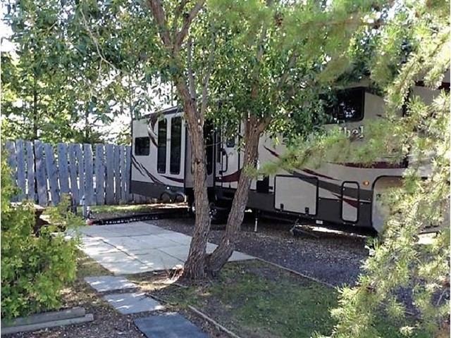 A beautiful treed campsite.