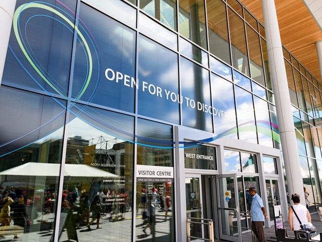 Glass-fronted Visitor Centre with “Open for You to Discover” sign and free entrance.