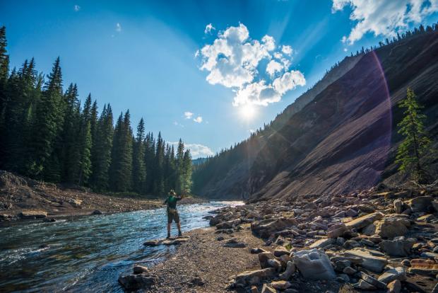 Man Fly Fishing at Ram Falls Provincial Park.