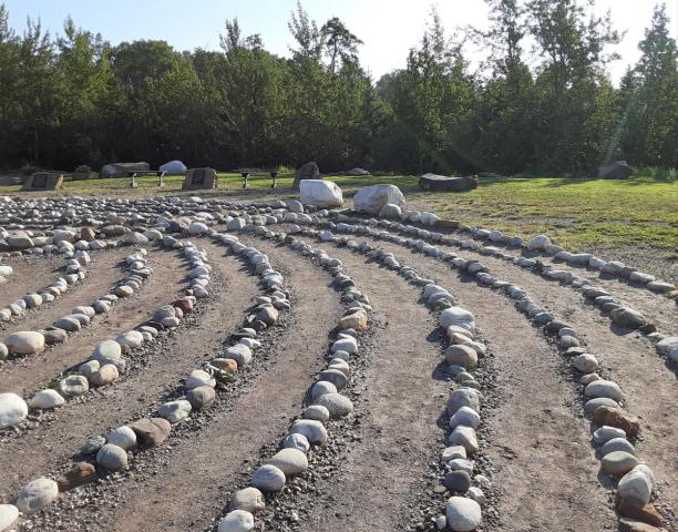 A close-up of the stone pathways in the labyrinth, highlighting the detailed craftsmanship and natural beauty of the park.