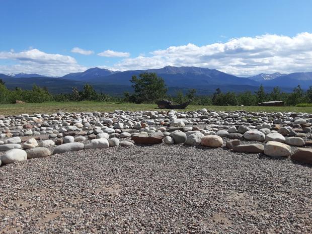 A scenic shot of the labyrinth with mountains in the background.