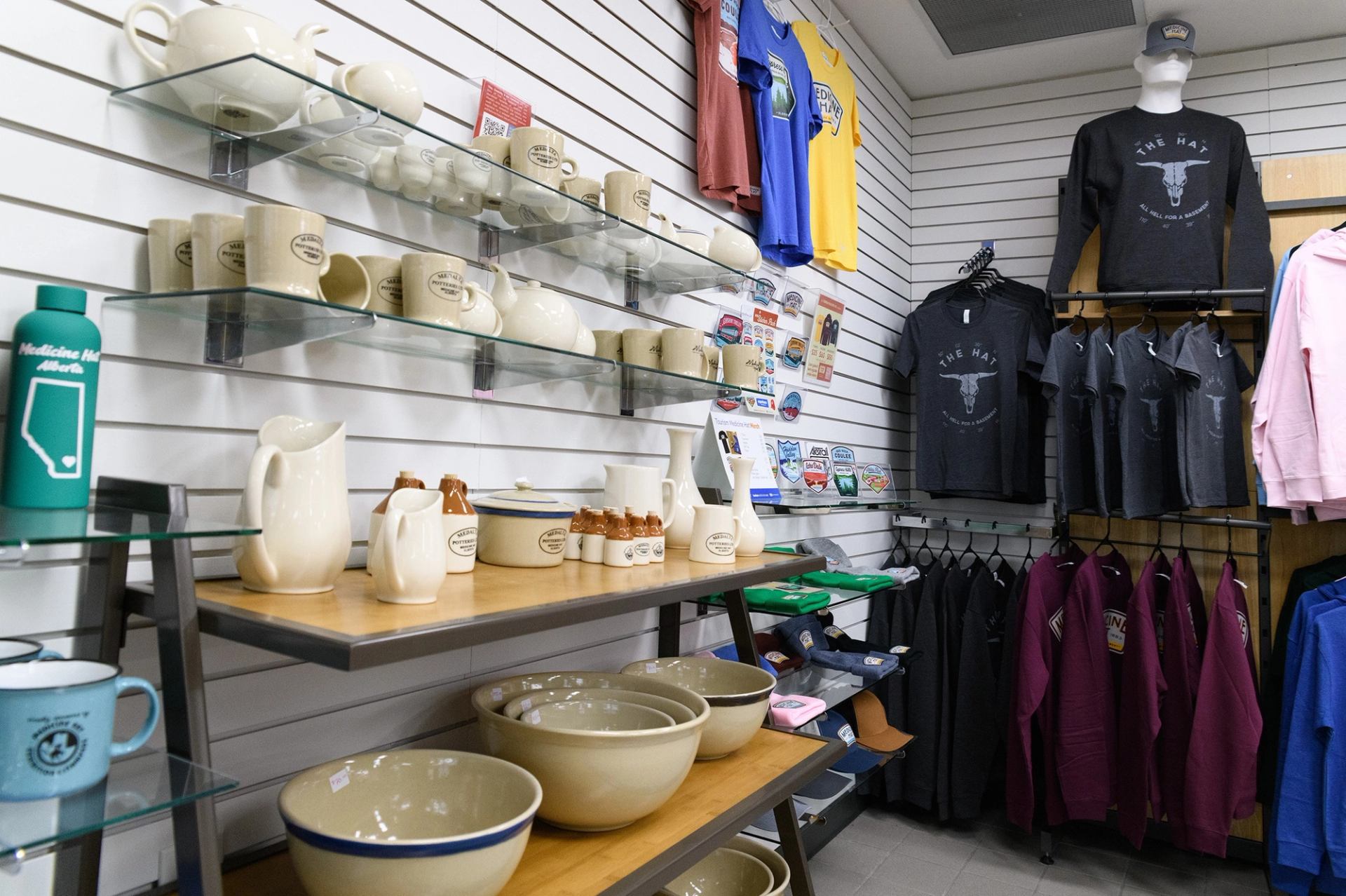 Ceramics and clothing on display at Medicine Hat Visitor Centre.
