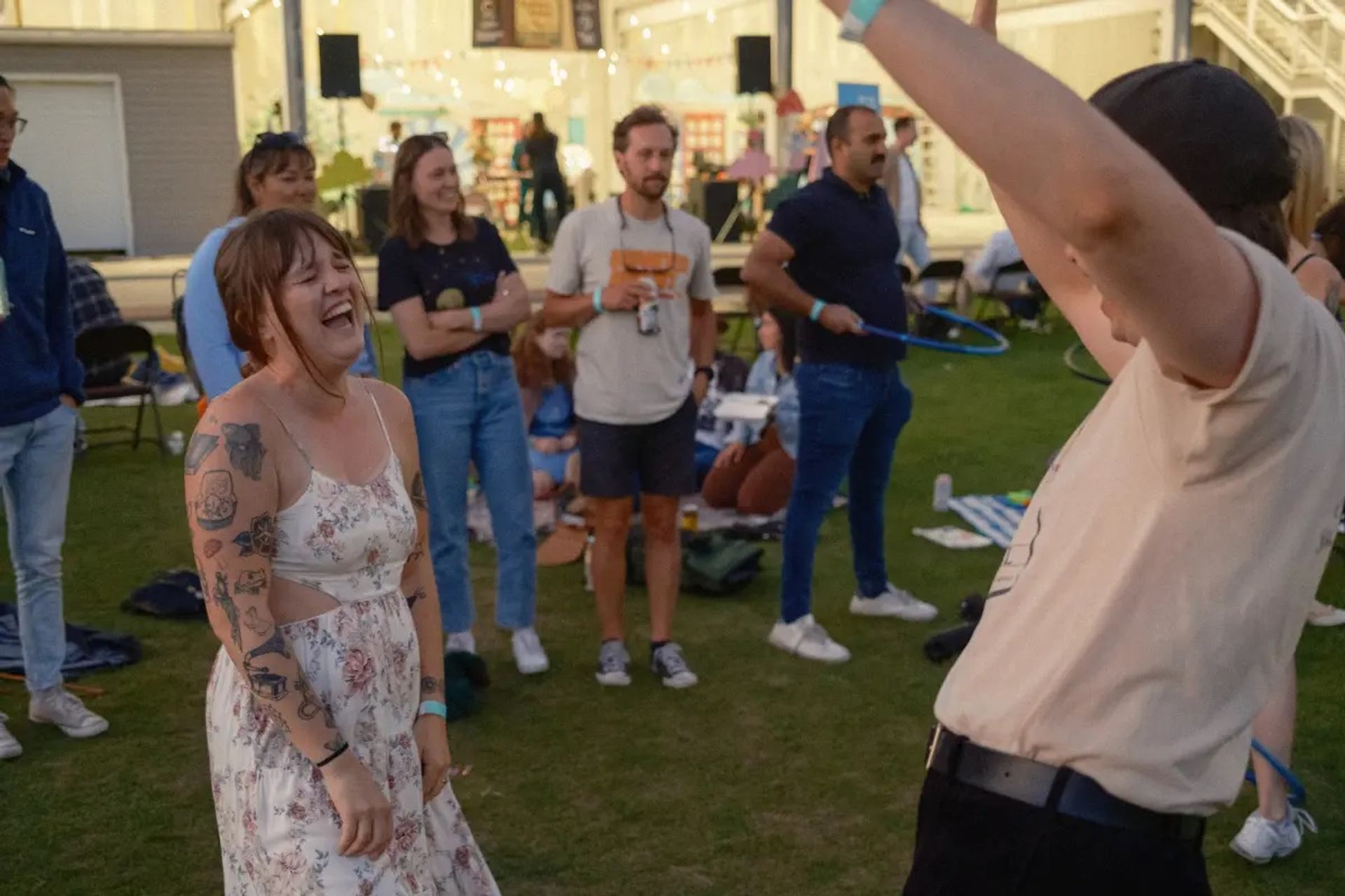 People dancing and enjoying the music at the festival.