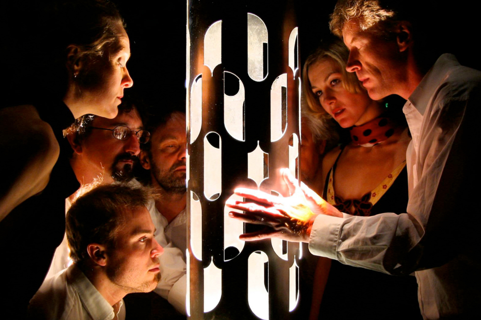 Cast members stare into the Dream Machine.