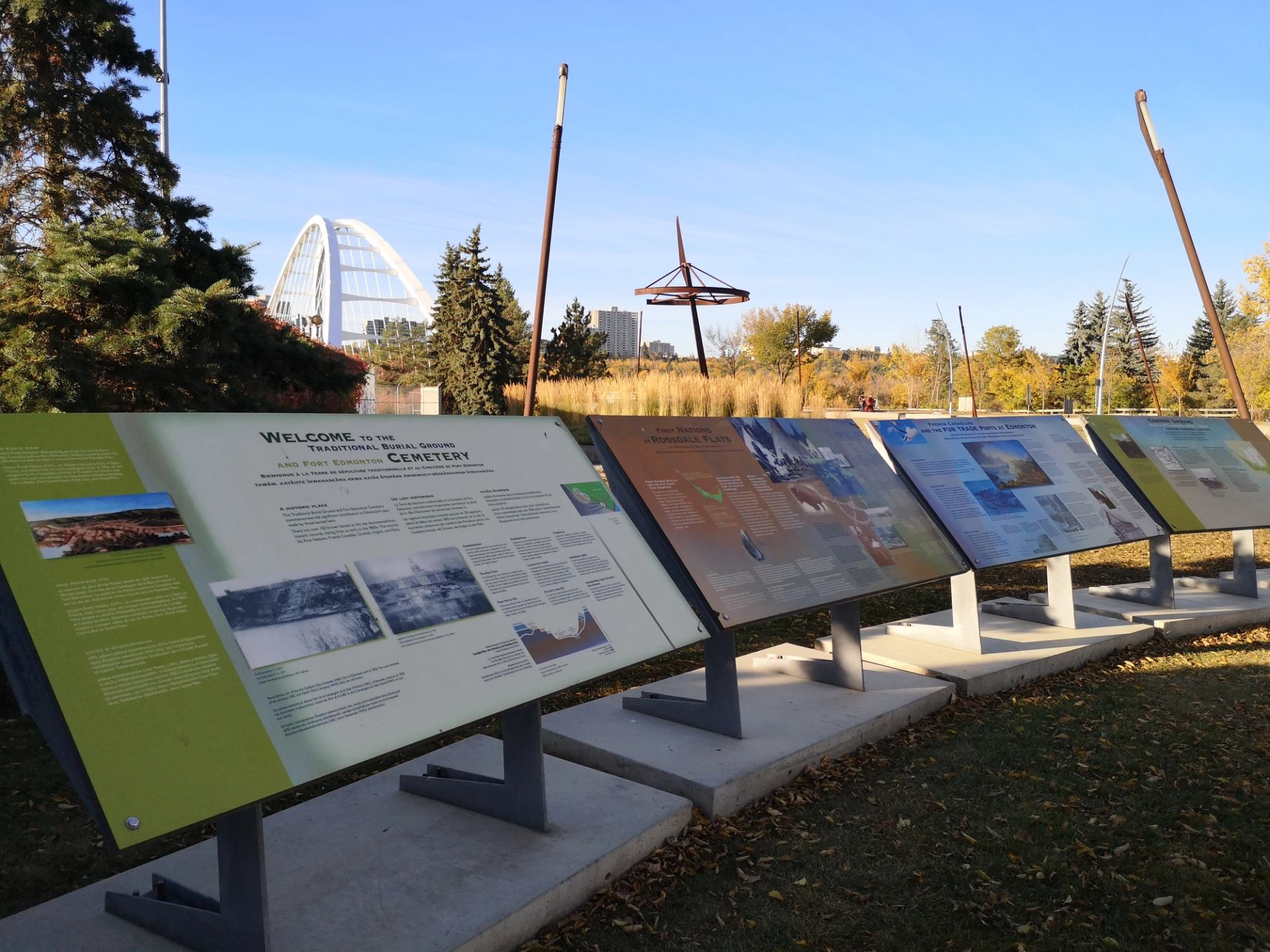 Outdoor information storyboards located in an ancient burial ground and Fort Edmonton Cemetery.