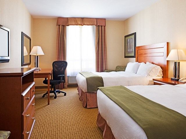 A guest room with two beds