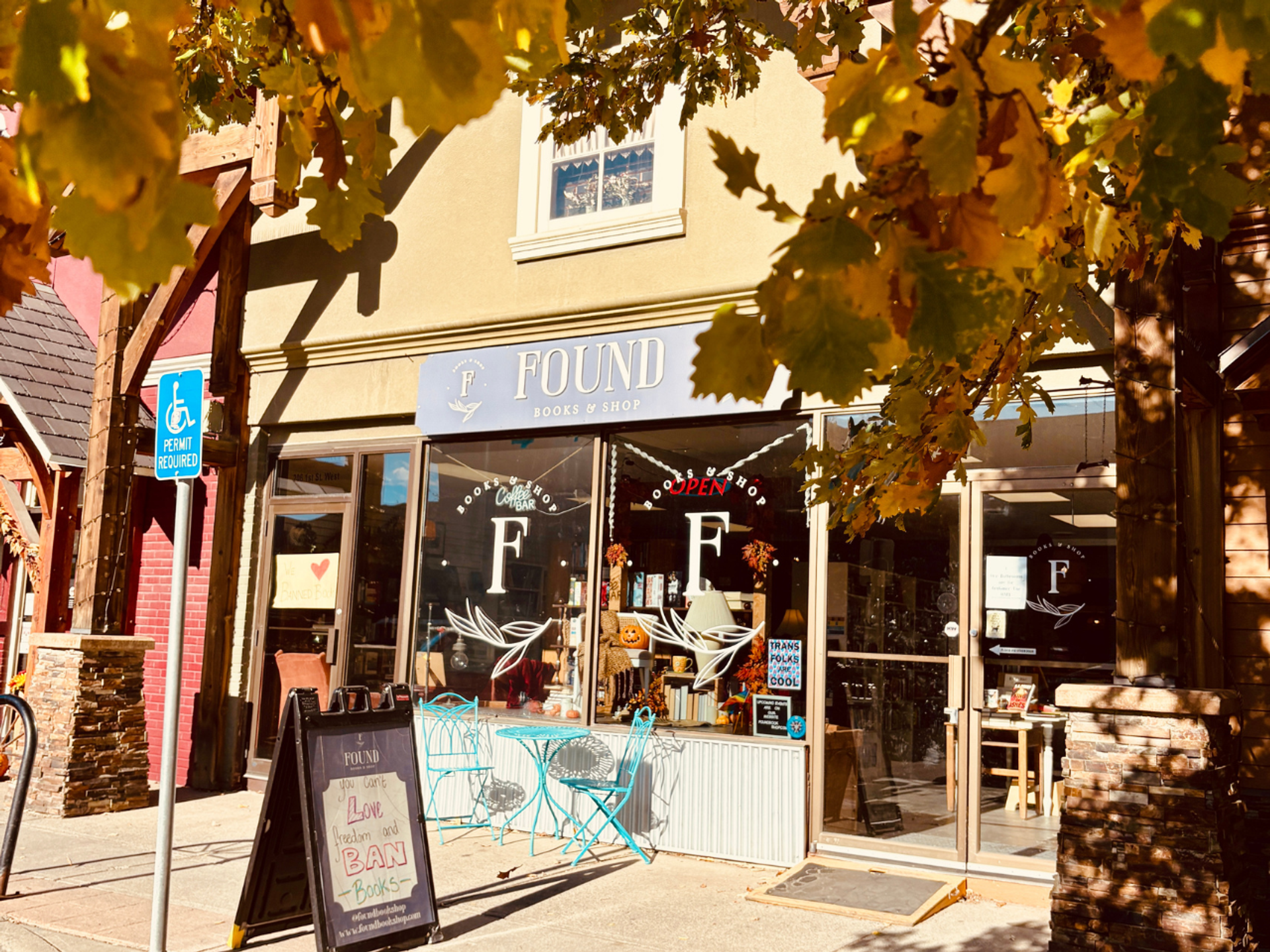 Found bookstore storefront from street view with fall tree colours