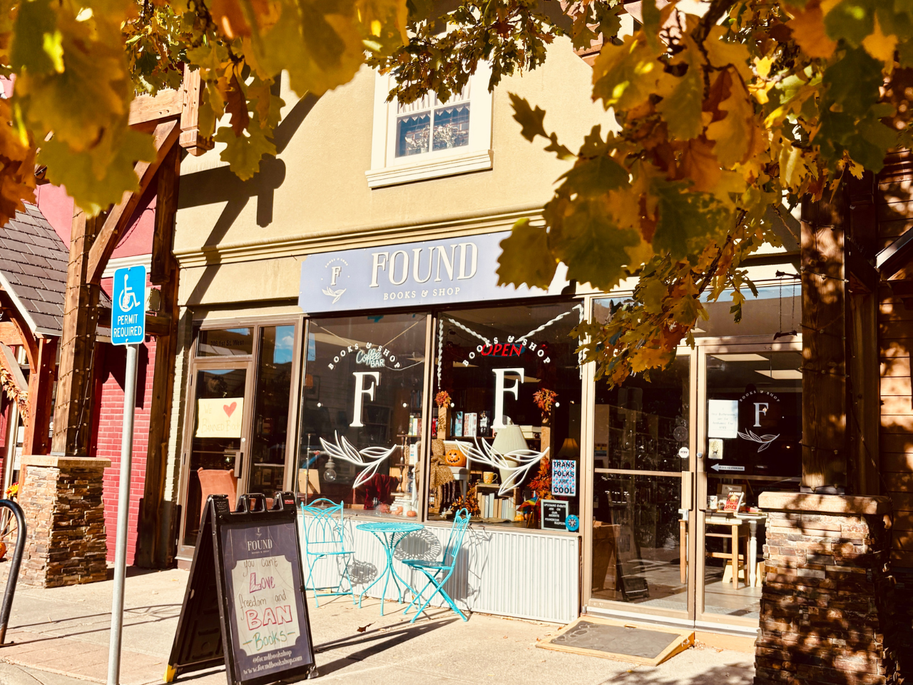 Found bookstore storefront from street view with fall tree colours