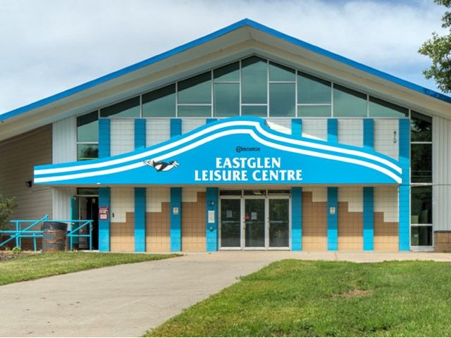 Eastglen Leisure Centre entrance with blue-and-white canopy and glass doors in Edmonton.