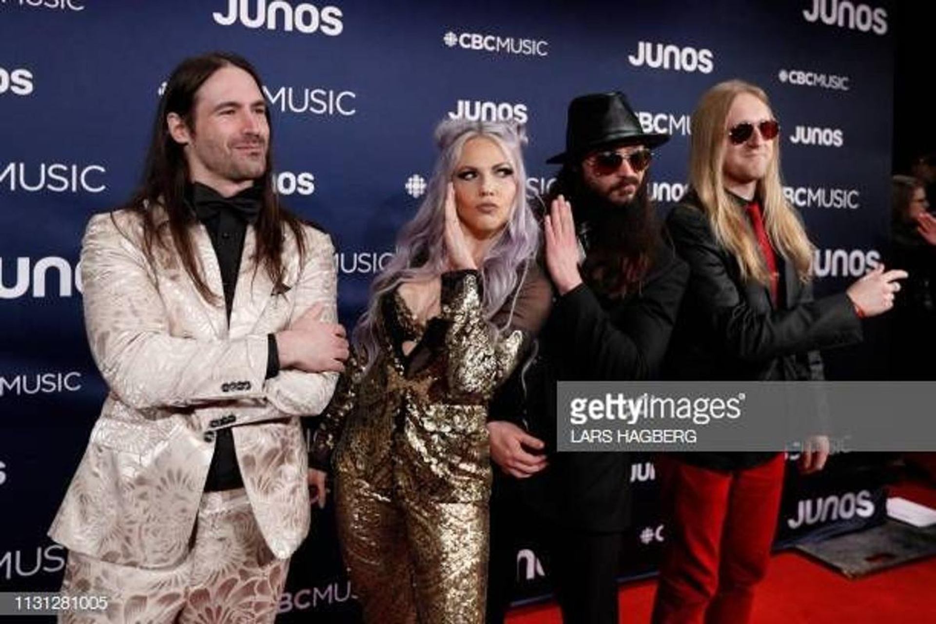 Cobra and the Lotus wearing Suits by Curtis Eilot