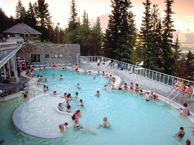 A crowd of people at Banff Upper Hot Springs in Banff National Park.