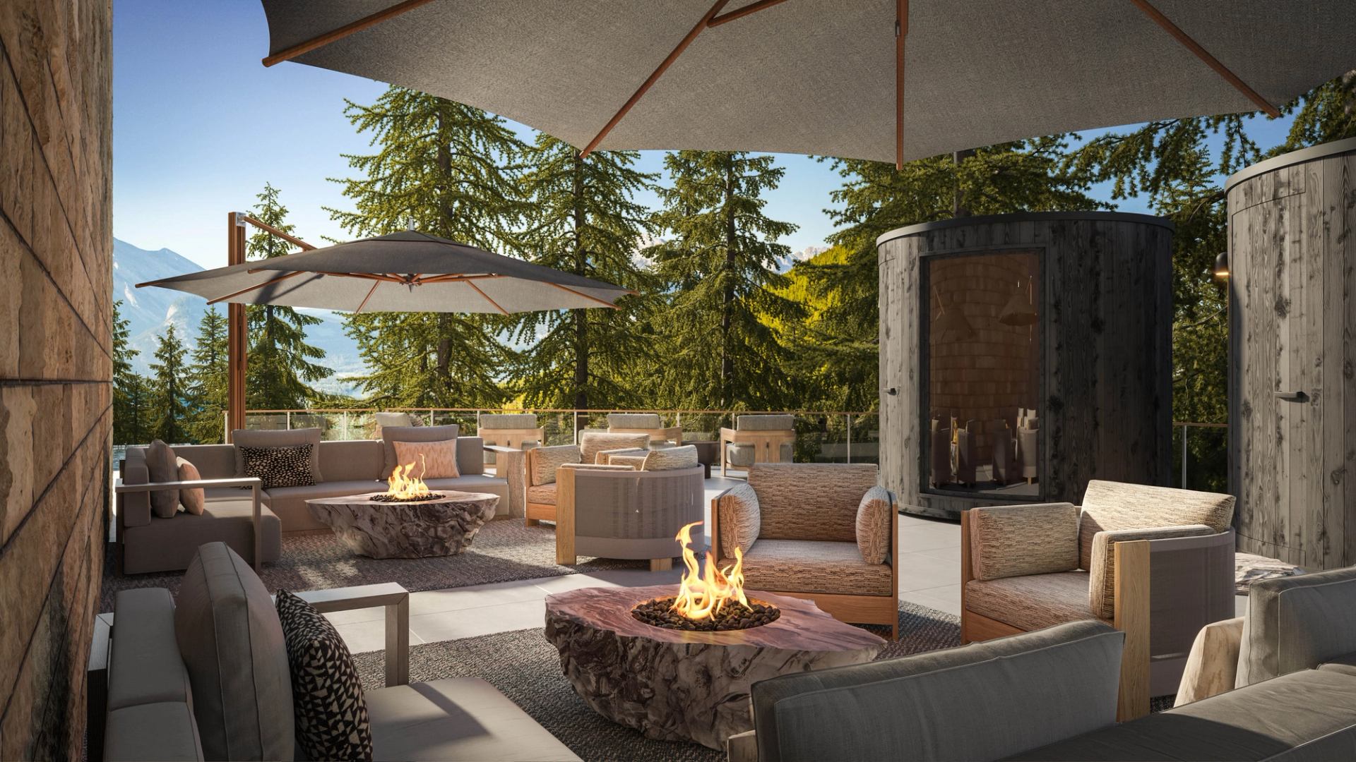 Outdoor terrace with fire pits, lounge seating, and forest views at Rimrock Banff, Emblems Collection.