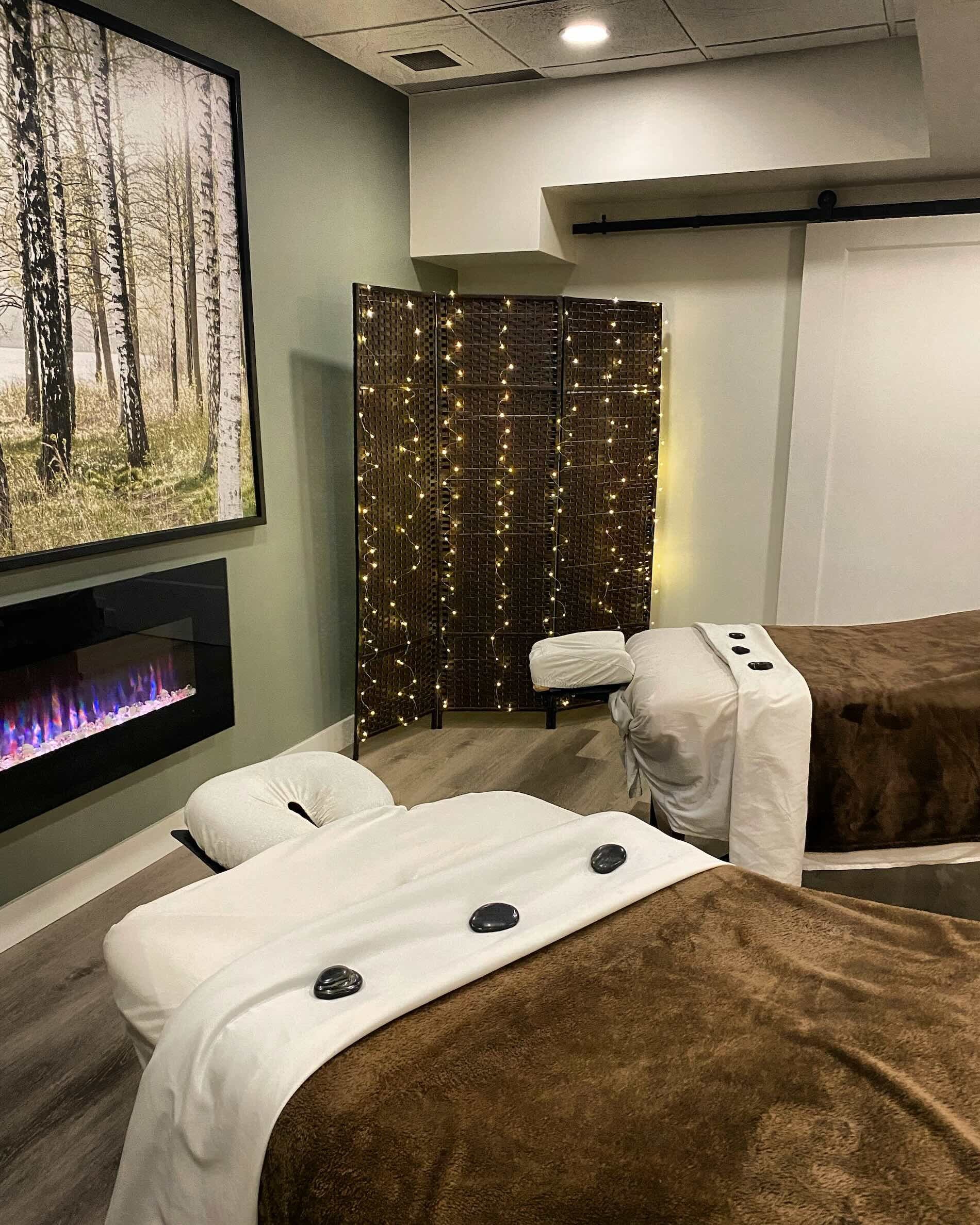 Massage room at Bodhi Wellness with double massage tables.