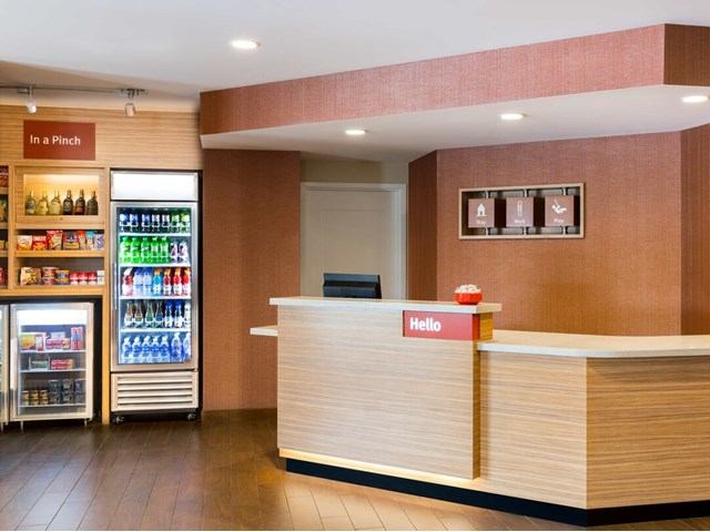 TownePlace Suites front desk with snack and beverage area.