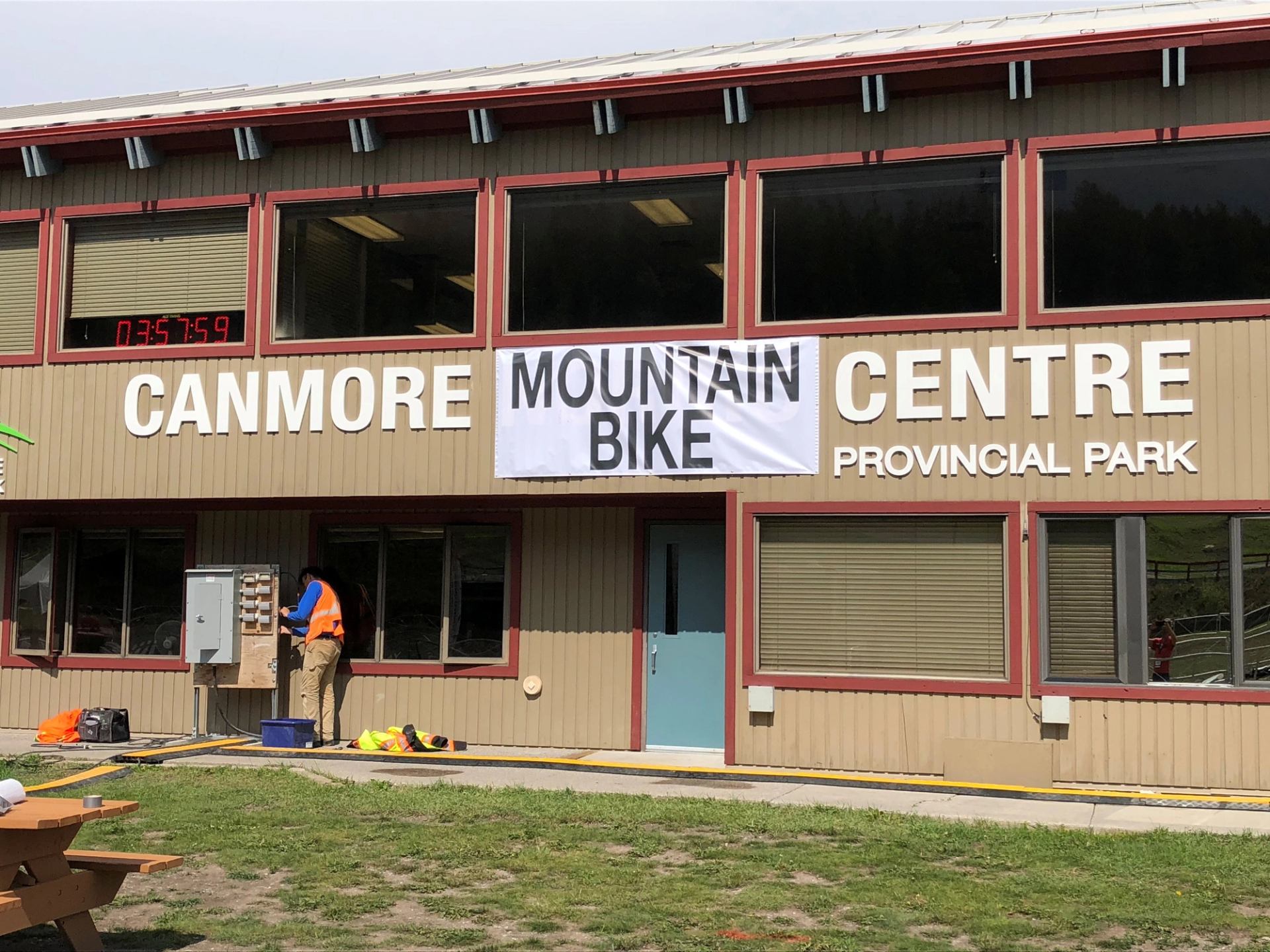 Exterior of the Canmore Mountain Centre with a Mountain Bike Centre banner during the Canmore Continental Series.